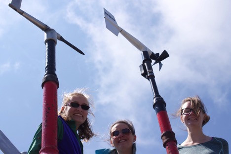 Liz, Shannon, and Rachel on top of New England at the Observatory tower next to two anemometers. Photo: Sophie Adams